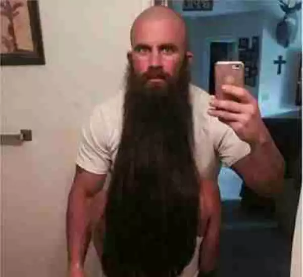What Is Wrong With This Photo Of A Bearded Man ?